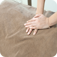 マッサージ中の写真